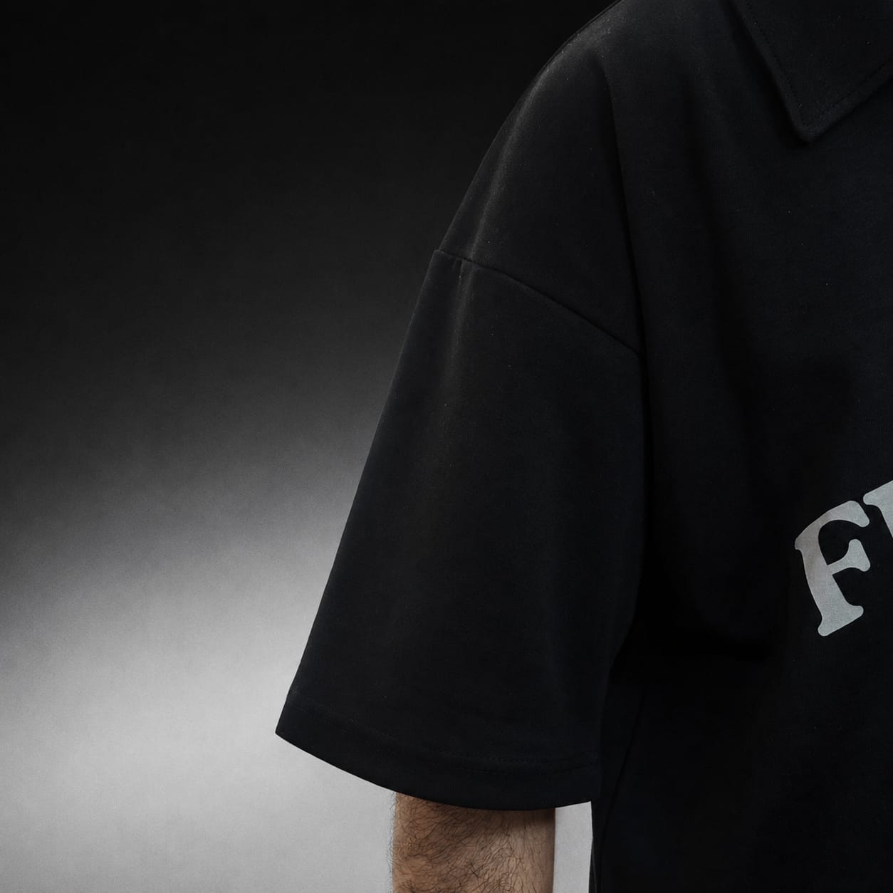 boxy-fit black polo